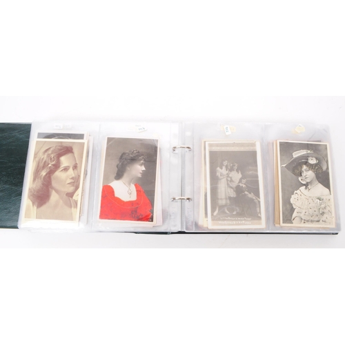 544 - A collection of Edwardian and early 20th century photographic portrait postcards. The collection fea... 