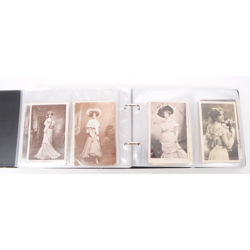 545 - A collection of Edwardian and early 20th century photgraphic portrait postcards. The collection feat... 