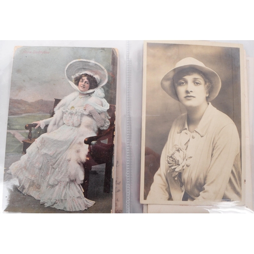 545 - A collection of Edwardian and early 20th century photgraphic portrait postcards. The collection feat... 