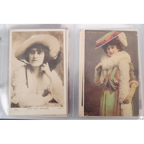 545 - A collection of Edwardian and early 20th century photgraphic portrait postcards. The collection feat... 