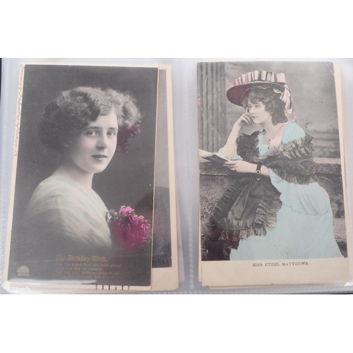 545 - A collection of Edwardian and early 20th century photgraphic portrait postcards. The collection feat... 