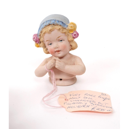 57 - Late 19th / early 20th century collection of four bisque small / miniature doll figures, comprised o... 