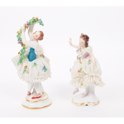 59 - Volkstedt Rudolstadt - Two mid century porcelain dancing lady figurines, both decorated with lace dr... 