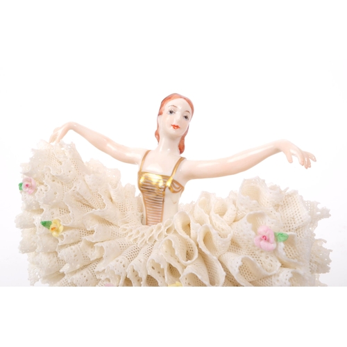 62 - Irish Dresden - A late 20th century porcelain dancer figurine, featuring a lace dress, hand painted ... 