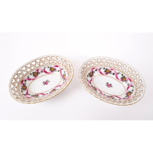 65 - A collection of 20th century German porcelain dishes and bowl, comprised of two small trinket dishes... 