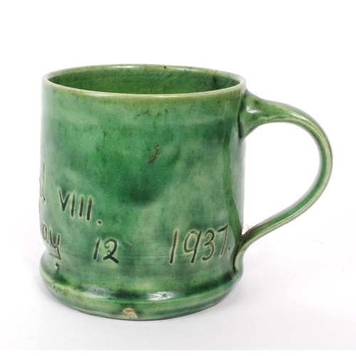 66 - Ewenny Studio Pottery - A vintage mid century Edward VIII Coronation 1937 ceramic tankard, in a gree... 