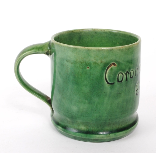 66 - Ewenny Studio Pottery - A vintage mid century Edward VIII Coronation 1937 ceramic tankard, in a gree... 