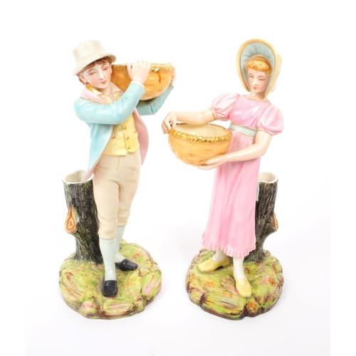 67 - Royal Worcester - Two late 19th century porcelain figurines / spill vases, in the manner of Kate Gre... 