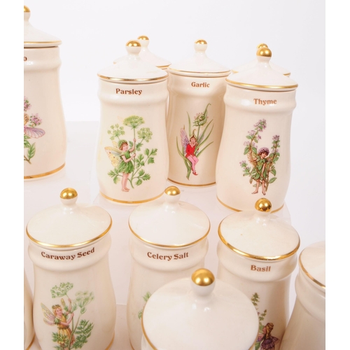 69 - A collection of vintage 1980s and 1990s Flower Fairy ceramic lidded spice jars by Gresham Marketing,... 