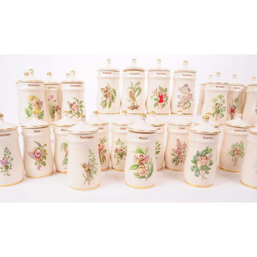 69 - A collection of vintage 1980s and 1990s Flower Fairy ceramic lidded spice jars by Gresham Marketing,... 