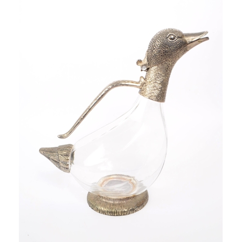 71 - A 20th century silver plated duck claret jug / carafe. The carafe having a shaped glass body, with s... 