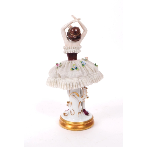 80 - Sitzendorf - 20th century German porcelain lady dancer figure. Featured in a lace dress encrusted wi... 