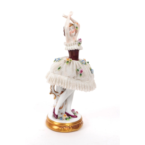 80 - Sitzendorf - 20th century German porcelain lady dancer figure. Featured in a lace dress encrusted wi... 