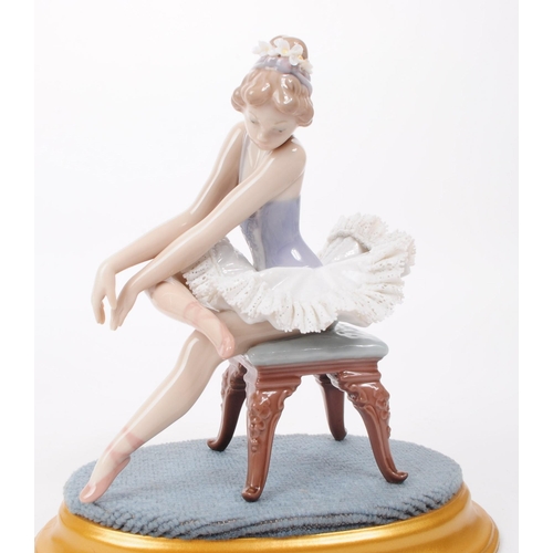 82 - Lladro - Two late 20th century porcelain Ballerina lady figures, comprised of a sitting Ballerina no... 