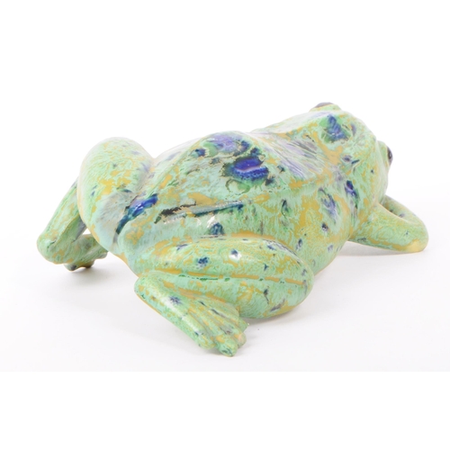 9 - A late 20th century Dutcher's Studio Monsterrat pottery frog figure, featuring shades of green, blue... 