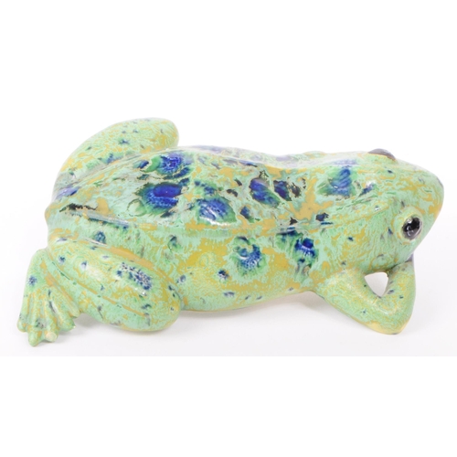 9 - A late 20th century Dutcher's Studio Monsterrat pottery frog figure, featuring shades of green, blue... 