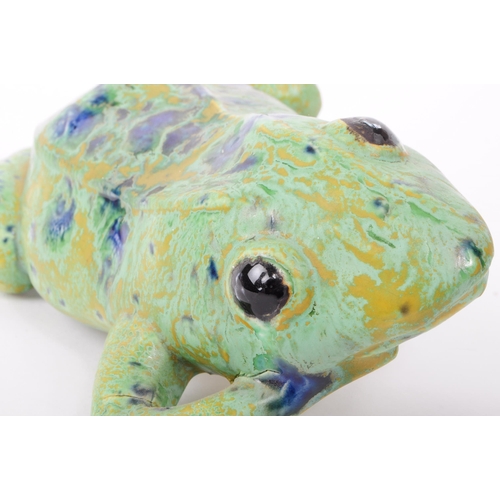 9 - A late 20th century Dutcher's Studio Monsterrat pottery frog figure, featuring shades of green, blue... 