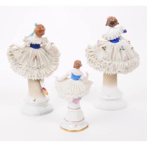 90 - Dresden - Three 20th century German porcelain lady figurines, dressed in lace skirts and encrusted h... 