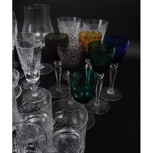 16 - A collection of 20th century crystal cut and acid etched glassware, including examples by Thomas Web... 