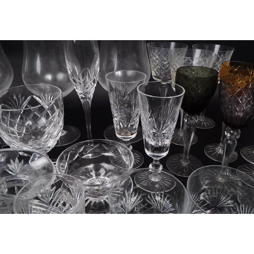 16 - A collection of 20th century crystal cut and acid etched glassware, including examples by Thomas Web... 