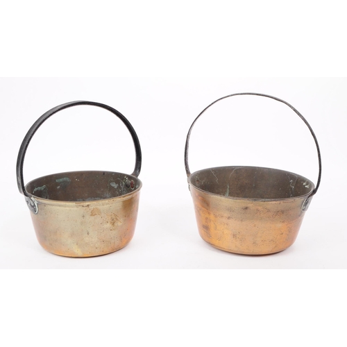 205A - Two 19th century copper cooking pots. Each having wrought metal handle above rounded copper cooking ... 