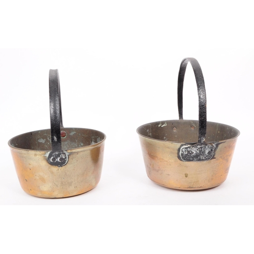 205A - Two 19th century copper cooking pots. Each having wrought metal handle above rounded copper cooking ... 