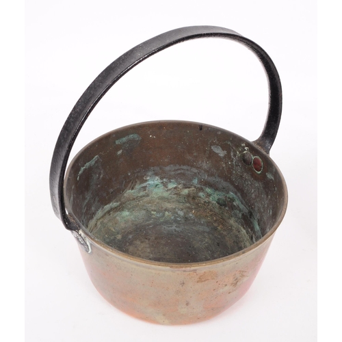 205A - Two 19th century copper cooking pots. Each having wrought metal handle above rounded copper cooking ... 