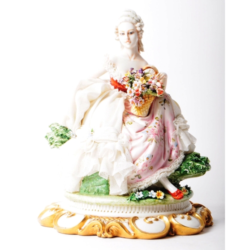 85 - Capodimonte - 20th century Italian porcelain lady figurine. Depicted in a lace dress holding a baske... 