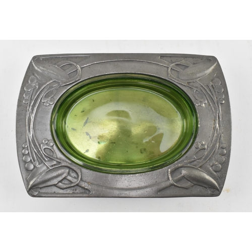 10 - Archibald Knox for Liberty and Co. - a Tudric English Pewter & green glass butter dish, together... 