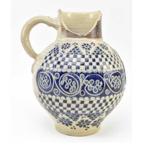 106 - An early 18th century c1720 Westerwald salt glazed stoneware jug, produced to commemorate the Corona... 