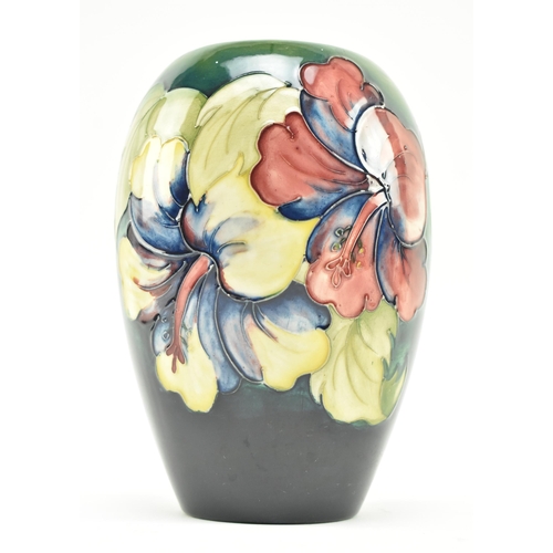 117 - Moorcroft Pottery - Two 20th century tube lined glazed ceramic vases in the Hibiscus and Anemone pat... 