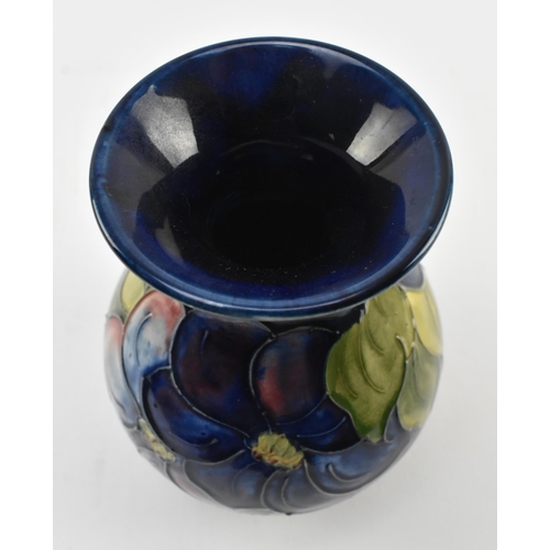 117 - Moorcroft Pottery - Two 20th century tube lined glazed ceramic vases in the Hibiscus and Anemone pat... 