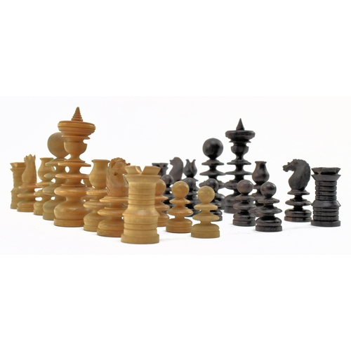 128 - A19th century Victorian Saint George style treen chess set housed in wooden box. The set hand turned... 