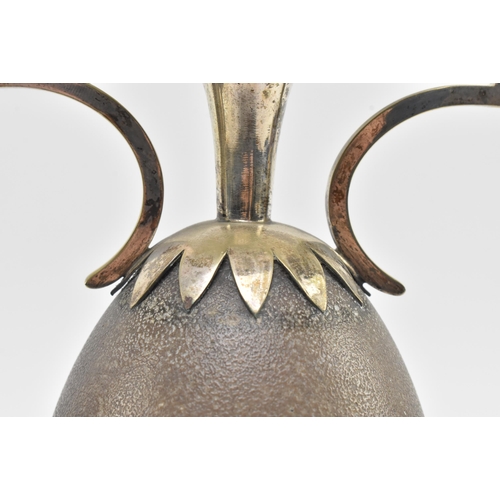 131 - A pair of early 20th century Australian vases, each formed from central emu egg. Each vase featuring... 