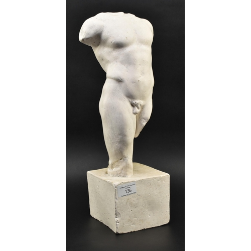 136 - A 20th century plaster figured sculpture of a male torso. The sculpture in a Neoclassical style, dep... 