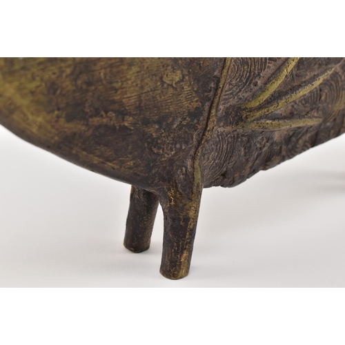 140 - A 19th century tribal West African Benin bronze fish sculpture. The fish depicting with open elongat... 