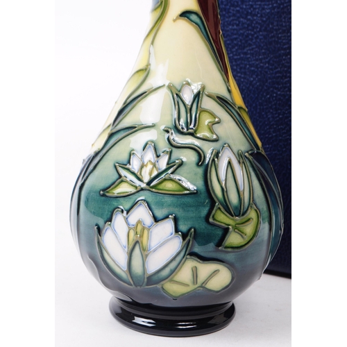 143 - William Moorcroft - Lamia pattern - a late 20th century ceramic vase. The vase of shouldered form fe... 