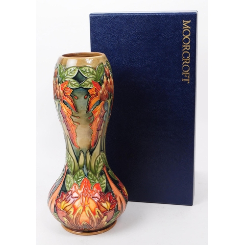 145 - William Moorcroft - Flame of The Forest pattern - a late 20th century ceramic vase designed by Phili... 