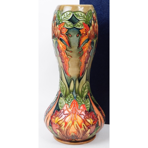 145 - William Moorcroft - Flame of The Forest pattern - a late 20th century ceramic vase designed by Phili... 