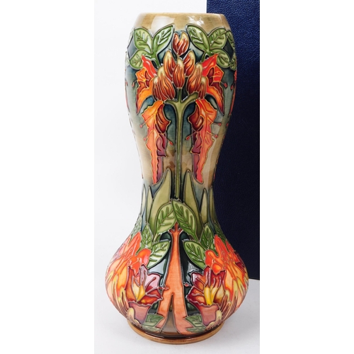 145 - William Moorcroft - Flame of The Forest pattern - a late 20th century ceramic vase designed by Phili... 