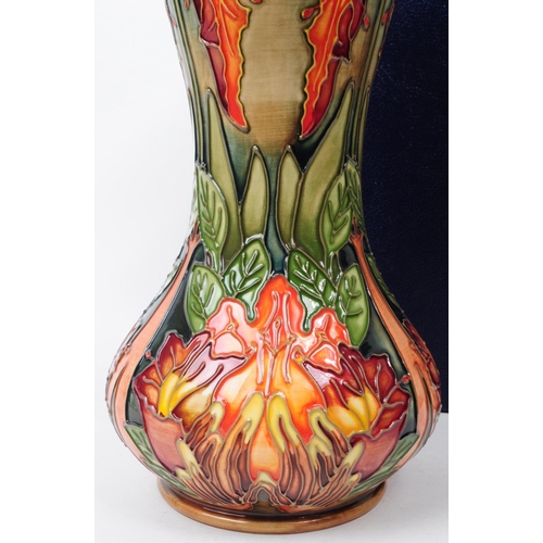 145 - William Moorcroft - Flame of The Forest pattern - a late 20th century ceramic vase designed by Phili... 