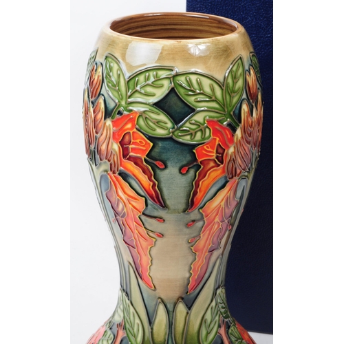 145 - William Moorcroft - Flame of The Forest pattern - a late 20th century ceramic vase designed by Phili... 