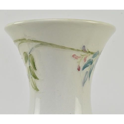 150 - William Moorcroft for Liberty & Co. - an early 20th century tube lined glazed ceramic vase in the Wi... 