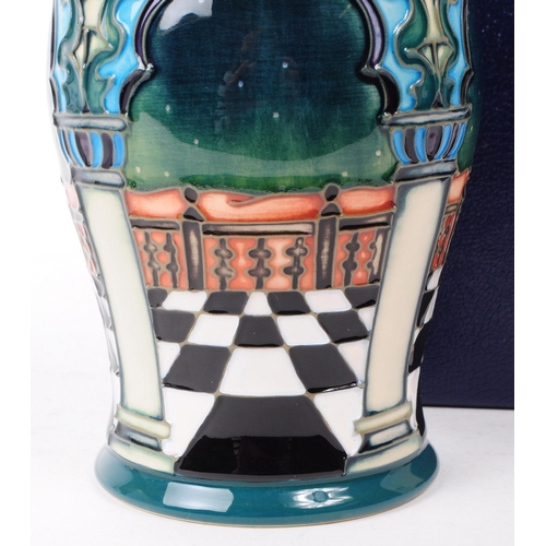 155 - Moorcraft - Jumeirah pattern - a late 20th century ceramic vase. In a circular bulbous form, with th... 