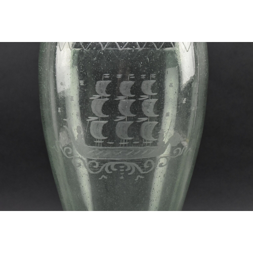 16 - A large 19th century Victorian etched green glass vase. The vase of baluster form having bubble deta... 