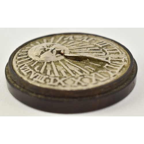 167 - A late 18th century George III miniature travel sundial. The sundial of circular form having a silve... 