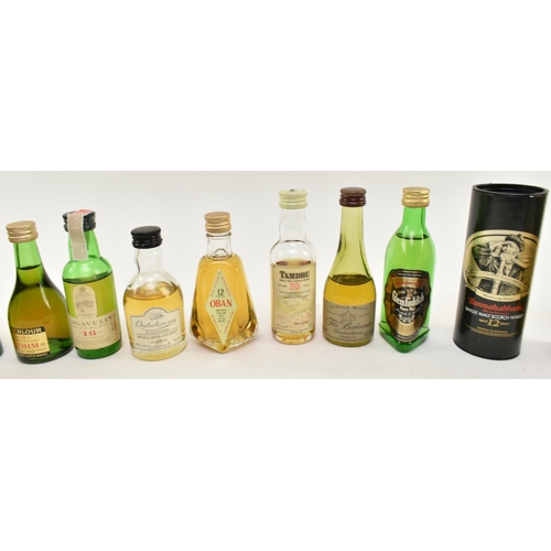 170 - A collection of miniature Old Scotch Whisky bottles. The lot to include a 10 years old Laphroaig unb... 