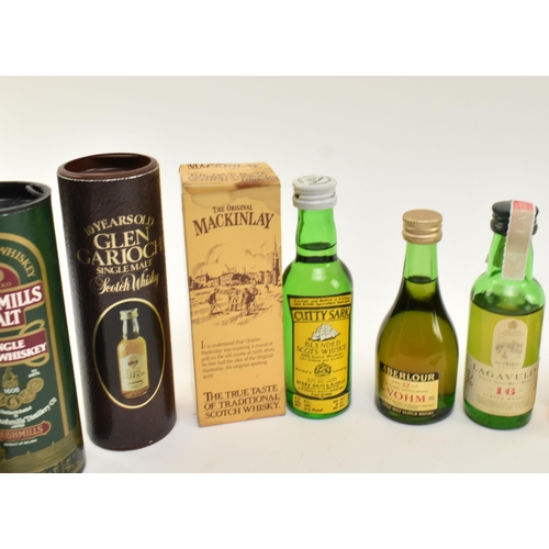 170 - A collection of miniature Old Scotch Whisky bottles. The lot to include a 10 years old Laphroaig unb... 