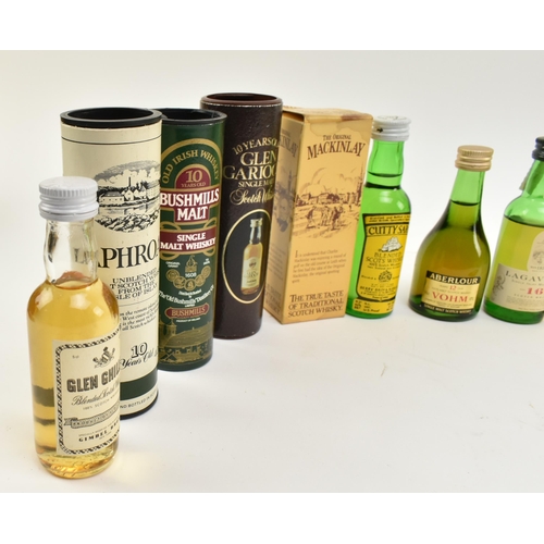 170 - A collection of miniature Old Scotch Whisky bottles. The lot to include a 10 years old Laphroaig unb... 