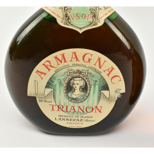 171 - Two vintage French liquor bottles. The lot to include a 1961 Armagnac Trianon VSOP bottle, seal appe... 